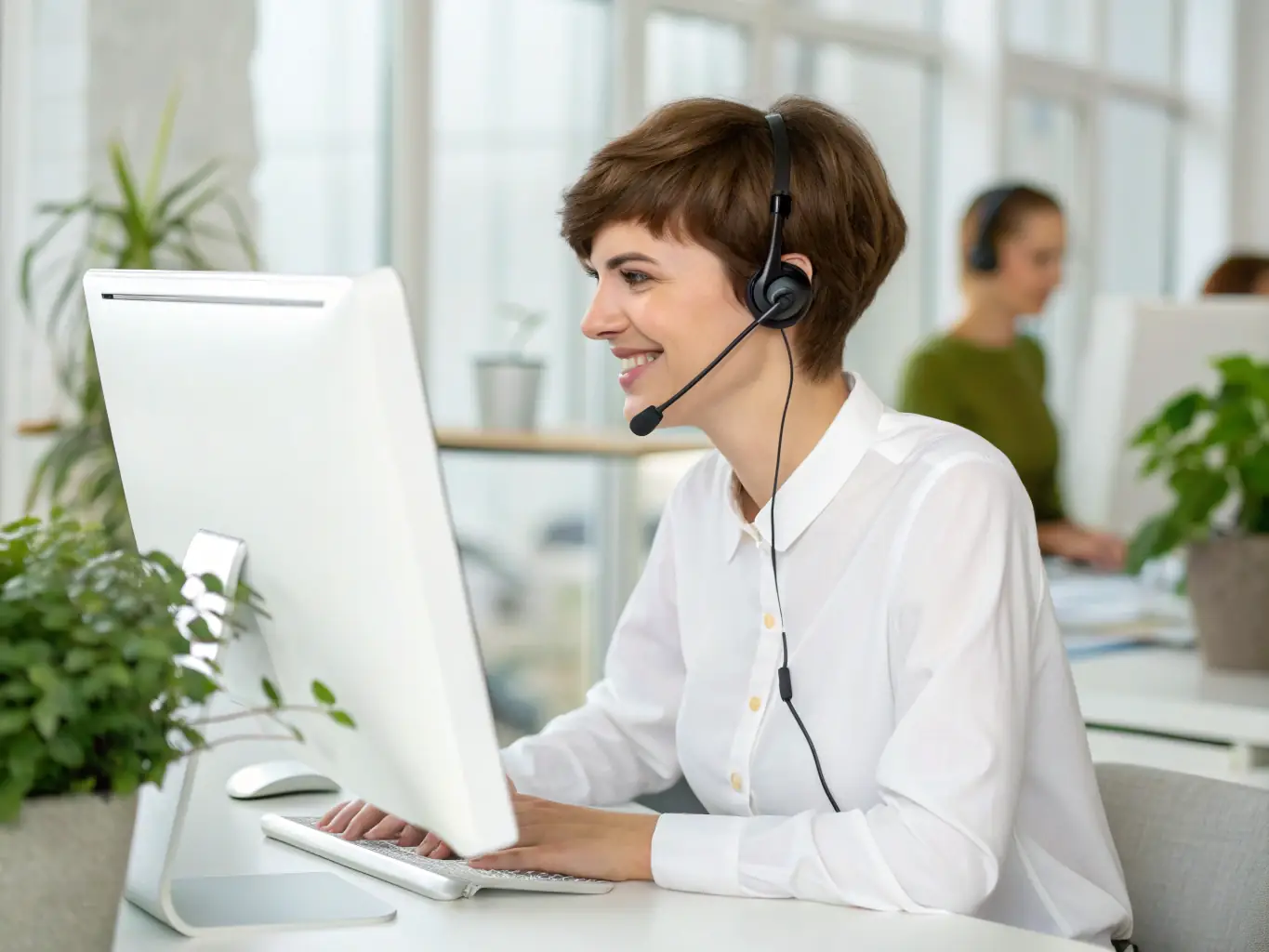 A help desk agent assisting a user with a technical issue over the phone, providing prompt and effective support.